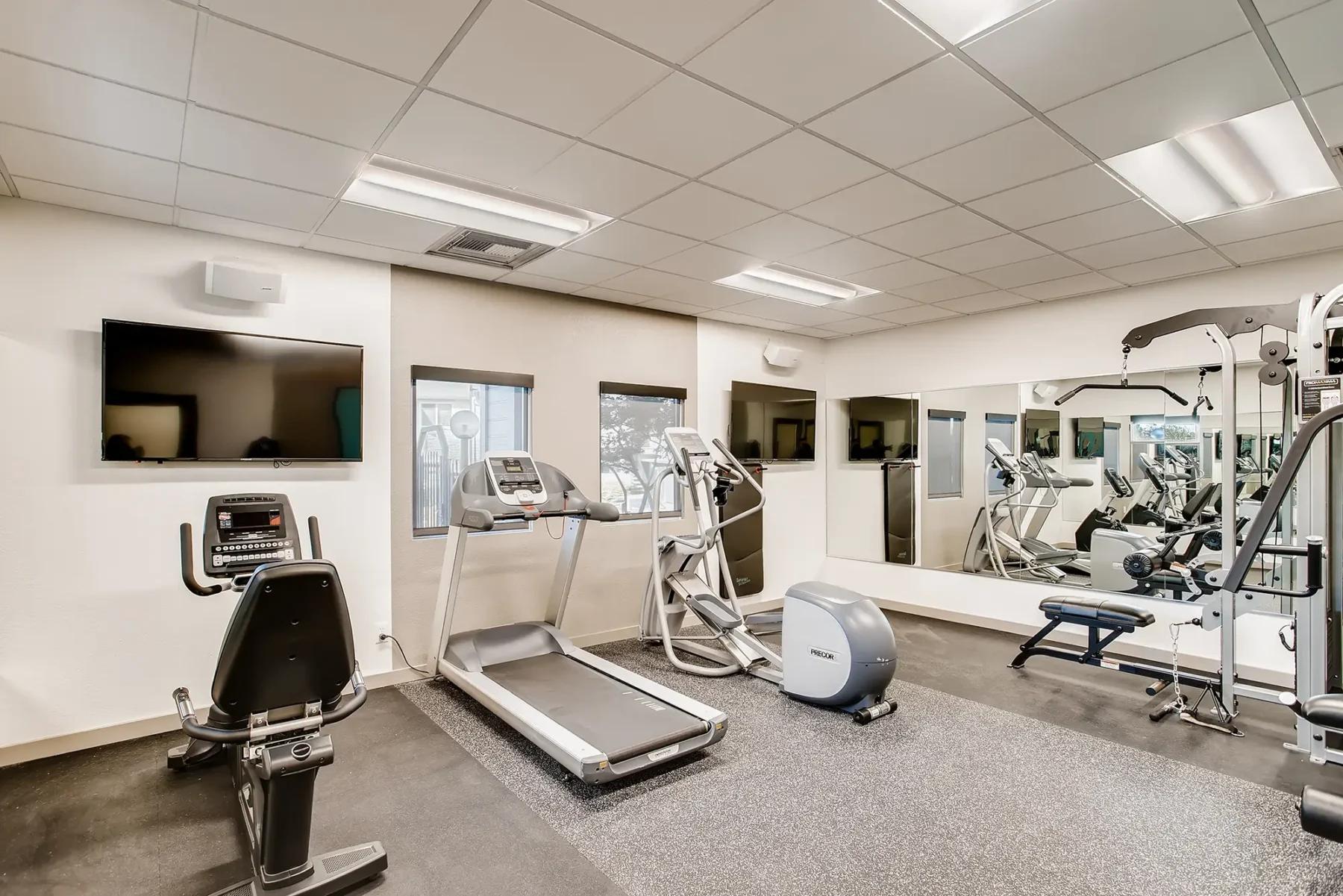 Fitness center with strength training and cardio machines