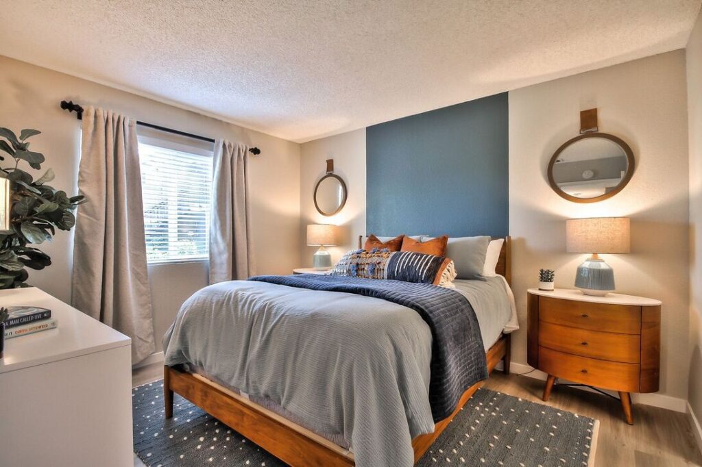 Bedroom with blue accent wall