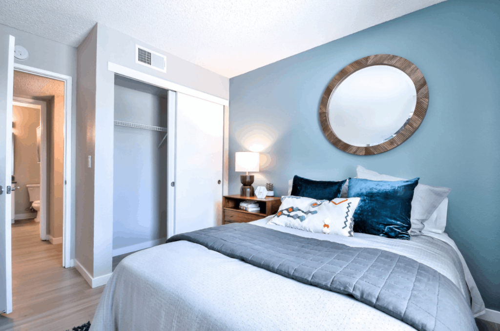 Bedroom with blue accent wall