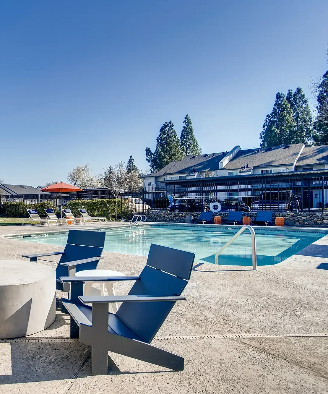 Pool with deck seating and spa